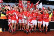 27 September 2009; Cork players celebrate with the Brendan Martin cup after their side's victory over Dublin. TG4 All-Ireland Ladies Football Senior Championship Final, Cork v Dublin, Croke Park, Dublin. Picture credit: Stephen McCarthy / SPORTSFILE