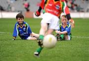28 September 2009; Paul Donnelly, left, age 8, from Goatstown, Dublin and Ed O'Shea, age 8, from Munterconnaught, Co. Cavan, watch an opponent take a penalty at the Vhi GAA Cúl Day Out in Croke Park. 288 children from all over the country togged out today in the world-famous Croke Park stadium to attend the Vhi GAA Cúl Day Out. The 288 children were the lucky winners in the competition which was open to 82,500 children who attended a Vhi GAA Cúl Camp during the summer. Vhi GAA Cúl Day Out, Croke Park, Dublin. Picture credit: Brendan Moran / SPORTSFILE