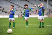 28 September 2009; Conor Breen, left, age 7, Bridgetown, Co. Wexford, Paul Donnelly, centre, age 8, from Goatstown, Dublin and Ed O'Shea, age 8, from Munterconnaught, Co. Cavan, wait their turn at the Vhi GAA Cúl Day Out in Croke Park. 288 children from all over the country togged out today in the world-famous Croke Park stadium to attend the Vhi GAA Cúl Day Out. The 288 children were the lucky winners in the competition which was open to 82,500 children who attended a Vhi GAA Cúl Camp during the summer. Vhi GAA Cúl Day Out, Croke Park, Dublin. Picture credit: Brendan Moran / SPORTSFILE