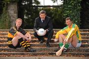 29 September 2009; Back to Business, Back to your Roots: Whether you experience glory or despair in the inter-county championships, every player returns to the solace of their club. Already back to action with their clubs, Ballybacon Grange and Dr Crokes respectively are beaten finalist Brendan Cummins, right, and All-Ireland medal winner Colm “Gooch” Cooper, pictured at the launch of the 2009/2010 AIB GAA Club Championships, with Billy Finn, AIB. Herbert Park, Dublin. Picture credit: Brendan Moran / SPORTSFILE