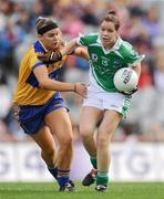 27 September 2009; Caroline Little, Fermanagh, in action against Louise Woods, Clare. TG4 All-Ireland Ladies Football Intermediate Championship Final, Clare v Fermanagh, Croke Park, Dublin. Picture credit: Stephen McCarthy / SPORTSFILE