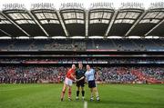 27 September 2009; Referee Declan Corcoran with Cork captain Mary O'Connor and Dublin captain Denise Masterson. TG4 All-Ireland Ladies Football Senior Championship Final, Cork v Dublin, Croke Park, Dublin. Picture credit: Stephen McCarthy / SPORTSFILE