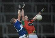 6 January 2016; John Murphy, Carlow, in action against Mark Timmons, Laois. Bord na Mona O'Byrne Cup, Group C, Laois v Carlow, O'Moore Park, Portlaoise, Co. Laois. Picture credit: Matt Browne / SPORTSFILE