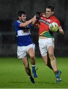 6 January 2016; Brendan Murphy, Carlow, in action against Martin Scully, Laois. Bord na Mona O'Byrne Cup, Group C, Laois v Carlow, O'Moore Park, Portlaoise, Co. Laois. Picture credit: Matt Browne / SPORTSFILE