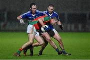 6 January 2016; Gary Kelly, Carlow, in action against Evan Costello and Paul Cahillane, Laois. Bord na Mona O'Byrne Cup, Group C, Laois v Carlow, O'Moore Park, Portlaoise, Co. Laois. Picture credit: Matt Browne / SPORTSFILE