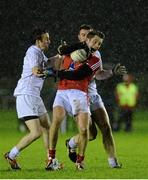 6 January 2016; Declan Byrne, Louth, is tackled by Ollie Lyons, left, and Daryl Flynn, Kildare. Bord na Mona O'Byrne Cup, Group B, Kildare v Louth, Hawkfield Centre of Excellence, Newbridge, Co. Kildare. Picture credit: Sam Barnes / SPORTSFILE