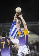 1 October 2009; Darren Magee, Kilmacud Crokes, contests a high ball with Michael McAuley, Ballyboden St. Enda's, during the Dublin County Senior Football Semi-Final. Parnell Park, Dublin. Picture credit: Dáire Brennan / SPORTSFILE