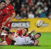 2 October 2009; Isaac Boss, Ulster, in action against Rhys Priestland, Llanelli Scarlets. Celtic League, Ulster v Llanelli Scarlets, Ravenhill Park, Belfast, Co. Antrim. Picture credit: Oliver McVeigh / SPORTSFILE