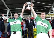4 October 2009; Paul McFlynn and Johnny McBride, Loup St Patrick's, celebrate with the John McLaughlin cup. Derry County Senior Football Final, Dungiven St Canice's v Loup St Patrick's, Celtic Park, Derry. Picture credit: Oliver McVeigh / SPORTSFILE