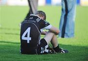 4 October 2009; A dejected David McLaughlin, Dungiven St Canice's, after the game. Derry County Senior Football Final, Dungiven St Canice's v Loup St Patrick's, Celtic Park, Derry. Picture credit: Oliver McVeigh / SPORTSFILE