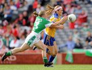 27 September 2009; Eimear Considine, Clare, races past the Fermanagh full-back Edel McGovern on her way to score a goal. TG4 All-Ireland Ladies Football Intermediate Championship Final, Clare v Fermanagh, Croke Park, Dublin. Picture credit: Ray McManus / SPORTSFILE