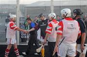 3 October 2009; Players from Loughgiel and Dunloy shake hands at the end of the final. Guinness, an official sponsor of the GAA Hurling All-Ireland Senior Championship, brought hurling off the pitch and into specially built 3D Perspex cubes this weekend in Cushendall GAA Club. Cushendall was selected as the first club to host a regional Guinness Hurling Cubed Invitational Championship. The eventual winners were Loughgiel GAA Club and players Karl Casey, Barney McAuley and Damien Quinn, were crowned champions of the Cushendall Guinness Hurling Cubed Invitational Championship 2009. Guinness has donated €1000 to the winning team’s GAA club, and the Cube has also be donated to Cushendall by Guinness. The Cushendall Guinness Hurling Cubed Invitational will be followed by similar events in Dunboyne GAA Club, Meath, Carlow IT, and Ahane GAA Club in Limerick during the month of October. Cushendall GAA Club, Cushendall, Co. Antrim. Picture credit: Oliver McVeigh / SPORTSFILE