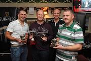 3 October 2009; Barney McAuley, left, Karl Casey and Damien Quinn, right, Loughgiel GAA club, receive their winners prizes from Johnny Davis, Pioneer Promotions, second from right, after being crowned champions of the Cushendall Guinness Hurling Cubed Invitational Championship 2009. Guinness, an official sponsor of the GAA Hurling All-Ireland Senior Championship, brought hurling off the pitch and into specially built 3D Perspex cubes this weekend in Cushendall GAA Club. Cushendall was selected as the first club to host a regional Guinness Hurling Cubed Invitational Championship. Guinness has donated €1000 to the winning team’s GAA club, and the Cube has also be donated to Cushendall by Guinness. The Cushendall Guinness Hurling Cubed Invitational will be followed by similar events in Dunboyne GAA Club, Meath, Carlow IT, and Ahane GAA Club in Limerick during the month of October. Cushendall GAA Club, Cushendall, Co. Antrim. Picture credit: Oliver McVeigh / SPORTSFILE