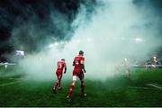 9 January 2016; Munster's Dave Foley, right, and Francis Saili run onto the pitch ahead of the game. European Rugby Champions Cup, Pool 4, Round 2 Refixture, Stade Francais Paris v Munster, Stade Jean Bouin, Paris, France. Picture credit: Ramsey Cardy / SPORTSFILE