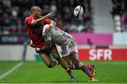 9 January 2016; Simon Zebo, Munster, is tackled by Waisea Vuidarvuwalu, Stade Français Paris. European Rugby Champions Cup, Pool 4, Round 2 Refixture, Stade Francais Paris v Munster, Stade Jean Bouin, Paris, France. Picture credit: Ramsey Cardy / SPORTSFILE
