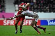 9 January 2016; Simon Zebo, Munster, is tackled by Waisea Vuidarvuwalu, Stade Français Paris. European Rugby Champions Cup, Pool 4, Round 2 Refixture, Stade Francais Paris v Munster, Stade Jean Bouin, Paris, France. Picture credit: Ramsey Cardy / SPORTSFILE