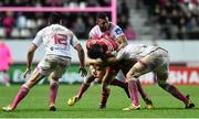 9 January 2016; Francis Saili, Munster, is tackled by Waisea Vuidarvuwalu, centre, and Paul Gabrillagues, Stade Français Paris. European Rugby Champions Cup, Pool 4, Round 2 Refixture, Stade Francais Paris v Munster, Stade Jean Bouin, Paris, France. Picture credit: Ramsey Cardy / SPORTSFILE