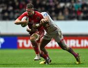 9 January 2016; Dave Kilcoyne, Munster, is tackled by Waisea Vuidarvuwalu, Stade Français Paris. European Rugby Champions Cup, Pool 4, Round 2 Refixture, Stade Francais Paris v Munster, Stade Jean Bouin, Paris, France. Picture credit: Ramsey Cardy / SPORTSFILE
