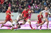 9 January 2016; Jack O'Donoghue, Munster, is tackled by Sekou Macalou, Stade Français Paris. European Rugby Champions Cup, Pool 4, Round 2 Refixture, Stade Francais Paris v Munster, Stade Jean Bouin, Paris, France. Picture credit: Ramsey Cardy / SPORTSFILE
