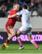 9 January 2016; Keith Earls, Munster, is tackled by Morné Steyn, Stade Français Paris. European Rugby Champions Cup, Pool 4, Round 2 Refixture, Stade Francais Paris v Munster, Stade Jean Bouin, Paris, France. Picture credit: Ramsey Cardy / SPORTSFILE