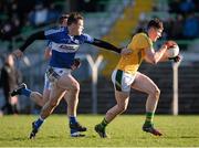 10 January 2016; Harry Rooney, Meath, in action against John O'Loughlin, Laois. Bord na Mona O'Byrne Cup, Section C, Meath v Laois, Páirc Tailteann, Navan, Co. Meath. Picture credit: Seb Daly / SPORTSFILE