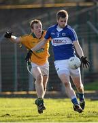 10 January 2016; Mark Timmons, Laois, in action against Donal Lenihan, Meath. Bord na Mona O'Byrne Cup, Section C, Meath v Laois, Páirc Tailteann, Navan, Co. Meath. Picture credit: Seb Daly / SPORTSFILE
