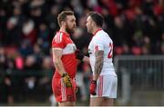 10 January 2016; Cathal McCarron, Tyrone, and Emmett McGuckin, Derry, exchange views shortly before McGuckin received a second yellow and subsequent red card and McCarron received a yellow card. Bank of Ireland Dr. McKenna Cup, Group A, Round 2, Derry v Tyrone. Derry GAA Centre of Excellence, Owenbeg, Derry. Picture credit: Stephen McCarthy / SPORTSFILE