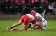 10 January 2016; Cathal McCarron, Tyrone, and Emmett McGuckin, Derry, tussle off the ball shortly before McGuckin received a second yellow and subsequent red card and McCarron received a yellow card. Bank of Ireland Dr. McKenna Cup, Group A, Round 2, Derry v Tyrone. Derry GAA Centre of Excellence, Owenbeg, Derry. Picture credit: Stephen McCarthy / SPORTSFILE