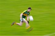 10 January 2016; Tom O'SullEvan, Kerry, solos the ball upfield during the game. McGrath Cup, Group A, Round 2, Kerry v Clare, Fitzgerald Stadium, Killarney, Co. Kerry. Picture credit: Brendan Moran / SPORTSFILE