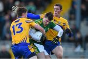 10 January 2016; Jamie O'SullEvan, Kerry, in action against Eoin Cleary, left, and Cathal O'Connor, Clare. McGrath Cup, Group A, Round 2, Kerry v Clare, Fitzgerald Stadium, Killarney, Co. Kerry. Picture credit: Brendan Moran / SPORTSFILE