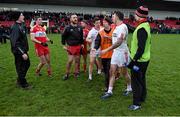 10 January 2016; Emmett McGuckin, Derry, third from left, who was sent off in the second half, confronts Cathal McCarron, Tyrone, second from right, after the game. Bank of Ireland Dr. McKenna Cup, Group A, Round 2, Derry v Tyrone. Derry GAA Centre of Excellence, Owenbeg, Derry. Picture credit: Stephen McCarthy / SPORTSFILE