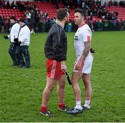 10 January 2016; Emmett McGuckin, Derry, who was sent off in the second half, confronts Cathal McCarron, Tyrone, after the game. Bank of Ireland Dr. McKenna Cup, Group A, Round 2, Derry v Tyrone. Derry GAA Centre of Excellence, Owenbeg, Derry. Picture credit: Stephen McCarthy / SPORTSFILE