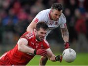 10 January 2016; Mark Lynch, Derry, in action against Cathal McCarron, Tyrone. Bank of Ireland Dr. McKenna Cup, Group A, Round 2, Derry v Tyrone. Derry GAA Centre of Excellence, Owenbeg, Derry. Picture credit: Stephen McCarthy / SPORTSFILE