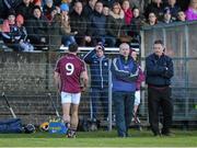 10 January 2016; Galway player David Burke, walks past Galway manager Micheál Donoghue centre and selector Noel Larkin, as he leave's the pitch after been sent off by referee James McGrath. Bord na Mona Walsh Cup, Group 4, Galway v DCU, Duggan Park, Ballinasloe, Co. Galway. Picture credit: David Maher / SPORTSFILE