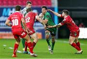 10 January 2016; Jake Heenan, Connacht, is tackled by Hadleigh Parkes and Steffan Evans, Scarlets. Guinness PRO12, Round 12, Scarlets v Connacht, Parc Y Scarlets, Llanelli, Wales. Picture credit: Chris Fairweather / SPORTSFILE