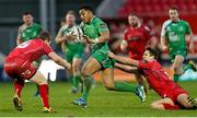 10 January 2016; Bundee Aki, Connacht, is tackled by Aled Thomas and Michael Collins, Scarlets. Guinness PRO12, Round 12, Scarlets v Connacht, Parc Y Scarlets, Llanelli, Wales. Picture credit: Chris Fairweather / SPORTSFILE