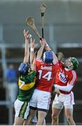 10 January 2016; Jason Diggins, Kerry, in action against Luke O'Farrell, 14, and Alan Cadogan, right, Cork. Munster Senior Hurling League, Round 2, Kerry v Cork, Mallow GAA Grounds, Mallow, Co. Cork. Picture credit: Eoin Noonan / SPORTSFILE