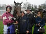 26 December 2016; Jockey Patrick Mullins with Eddie O'Leary, Gigginstown Stud, second from right, and winning connections, after winning aboard A Toi Phil in the Thornton's Recycling Maiden Hurdle. Leopardstown Christmas Racing Festival, Leopardstown Racecourse, Dublin. Picture credit: Cody Glenn / SPORTSFILE