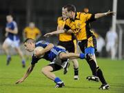 26 September 2009; Sean Burns, St. Gall's, in action against Paddy Carey, Portglenone Roger Casements. Antrim Senior County Football Final, St. Gall's, Belfast v Portglenone Roger Casements, Casement Park, Belfast. Picture credit: Oliver McVeigh / SPORTSFILE