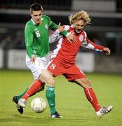 9 October 2009; Owen Garvan, Republic of Ireland, in action against Irakli Klimiashvili, Georgia. UEFA European U21 Championship Qualifier, Republic of Ireland v Georgia, Tallaght Stadium, Tallaght, Dublin. Picture credit: Matt Browne / SPORTSFILE