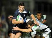 9 October 2009; Jonathan Sexton, Leinster, is tackled by Chris Malone, London Irish. Heineken Cup, Pool 6, Round 1, Leinster v London Irish, RDS, Dublin. Picture credit: Brendan Moran / SPORTSFILE