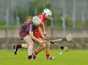 10 October 2009; Michelle Browne, Cork, in action against Jennifer Coone, Galway. Gala All-Ireland Intermediate Camogie Championship Final Replay, Cork v Galway, McDonagh Park, Nenagh, Co. Tipperary. Picture credit: Diarmuid Greene / SPORTSFILE