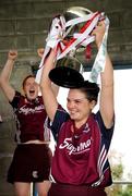 10 October 2009; Galway captain Caroline Kelly lifts the cup after victory over Cork. Gala All-Ireland Intermediate Camogie Championship Final Replay, Cork v Galway, McDonagh Park, Nenagh, Co. Tipperary. Picture credit: Diarmuid Greene / SPORTSFILE