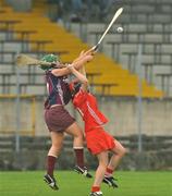 10 October 2009; Heather Cooney, Galway, in action against Marie Watson, Cork. Gala All-Ireland Intermediate Camogie Championship Final Replay, Cork v Galway, McDonagh Park, Nenagh, Co. Tipperary. Picture credit: Diarmuid Greene / SPORTSFILE