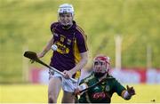 10 January 2016; Joe O'Connor, Wexford, in action against James Toher, Meath. Bord na Mona Walsh Cup, Group 3, Meath v Wexford, Páirc Tailteann, Navan, Co. Meath. Picture credit: Seb Daly / SPORTSFILE