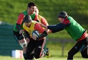 12 January 2016; Munster's Keith Earls in action against Billy Holland, left, and Denis Hurley during squad training. University of Limerick, Limerick. Picture credit: Diarmuid Greene / SPORTSFILE