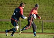 12 January 2016; Munster's Keith Earls passes to team-mate Mike Sherry during squad training. University of Limerick, Limerick. Picture credit: Diarmuid Greene / SPORTSFILE