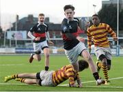 12 January 2016; Hugh O'Donnell, The High School, evades the tackle of Conor O'Donovan, De La Salle Churchtown. Bank of Ireland Schools Fr. Godfrey Cup, Round 1, De La Salle Churchtown v The High School, Donnybrook Stadium Donnybrook, Dublin. Picture credit: Cody Glenn / SPORTSFILE