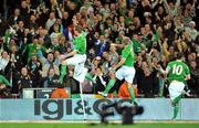 10 October 2009; Republic of Ireland's Glenn Whelan, left, celebrates after scoring his side's first goal with team-mates Liam Lawrence and Robbie Keane. 2010 FIFA World Cup Qualifier, Republic of Ireland v Italy, Croke Park, Dublin. Picture credit: David Maher / SPORTSFILE
