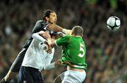 10 October 2009; Gianluigi Buffon, Italy, in action against Richard Dunne, Republic of Ireland. 2010 FIFA World Cup Qualifier, Republic of Ireland v Italy, Croke Park, Dublin. Picture credit: David Maher / SPORTSFILE
